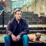 Jason Isaacs as Edinburgh private detective Jackson Brodie, with Ambassador in tow