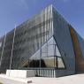 The new Jewish Museum's masculine and metallic exterior faces the monument ot the Ghetto Heroes