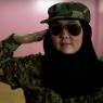 Uncertain salute: the very existence of women soldiers within the Afghan army depends on wider, political context