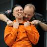Jail bird: Ryan Gage as prisoner Lee Fenton feels the attentions of David Schaal's warden