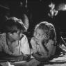 Georges Poujouly and Brigitte Fossey, up to something morbid in 'Forbidden Games'