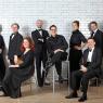 Members of La Nuova Musica with director David Bates (seated centre)
