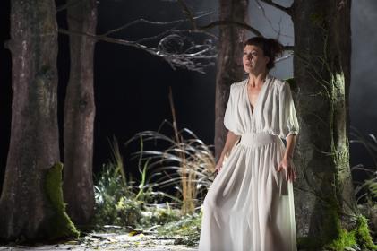 Helen McCrory as Medea, knife in hand, prepares for murder