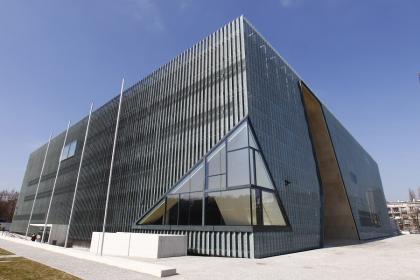 The new Jewish Museum's masculine and metallic exterior faces the monument ot the Ghetto Heroes