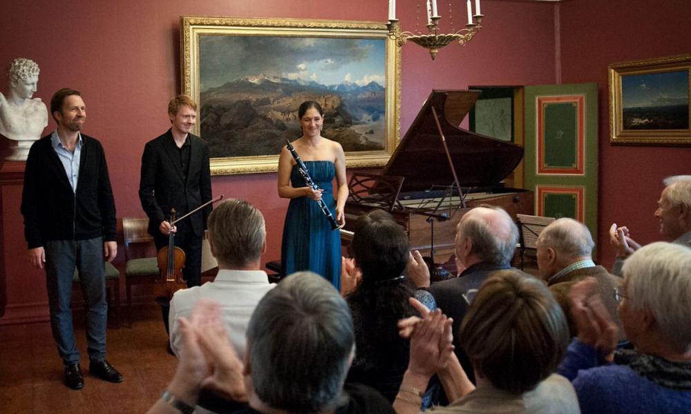 Leif Ove Andsnes, Eivind Holtsmark Ringstad and Sharon Kam after their performance of Schumann's 'Märchenerzählungen' in Baroniet Rosendal's Red Room