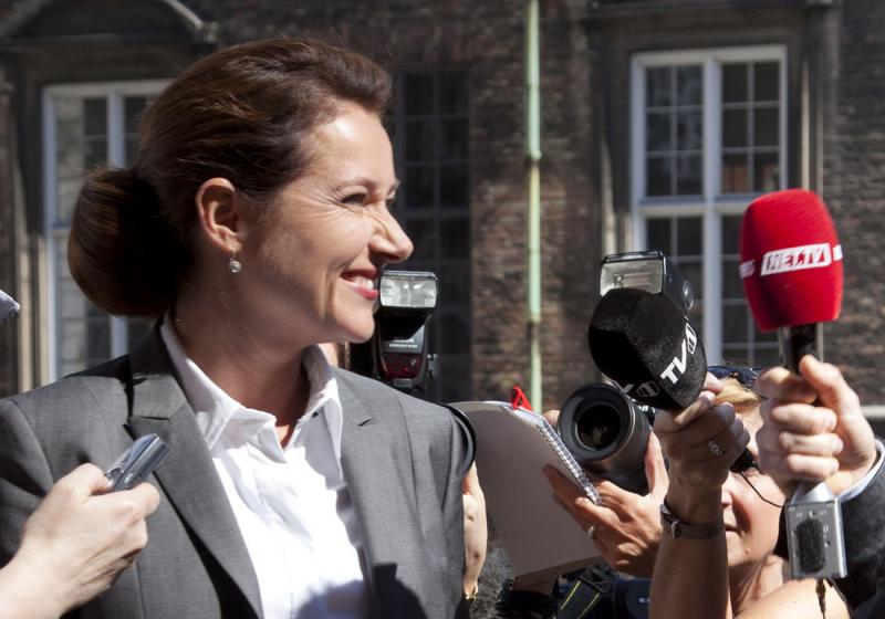 Birgitte Nyborg (Sidse Babett Knudsen) flashes trademark smile for the media