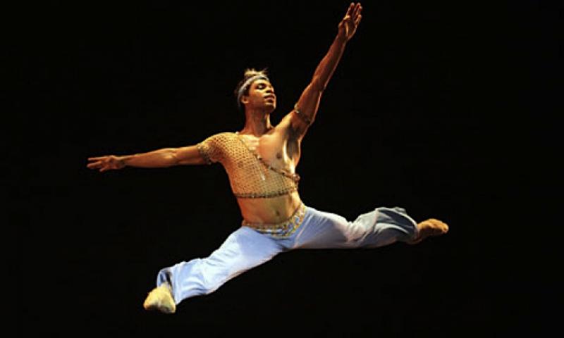 Top that: Carlos Acosta, here in 'Le Corsaire', sheds trappings to focus on the dance