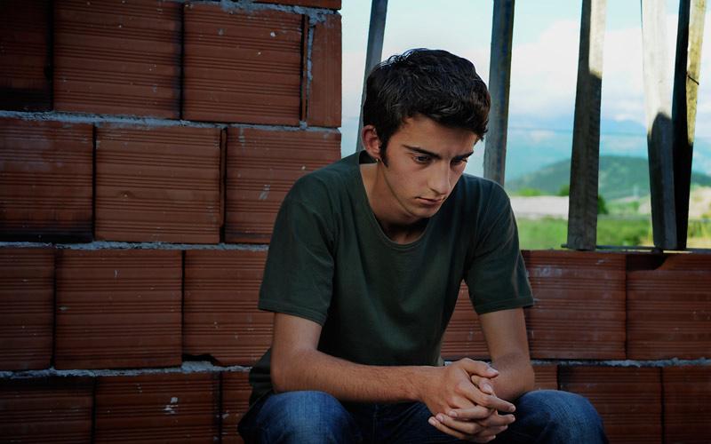 A teenager locked up at home - for blood feud reasons: Albania's Tristan Halilaj as hero Nik