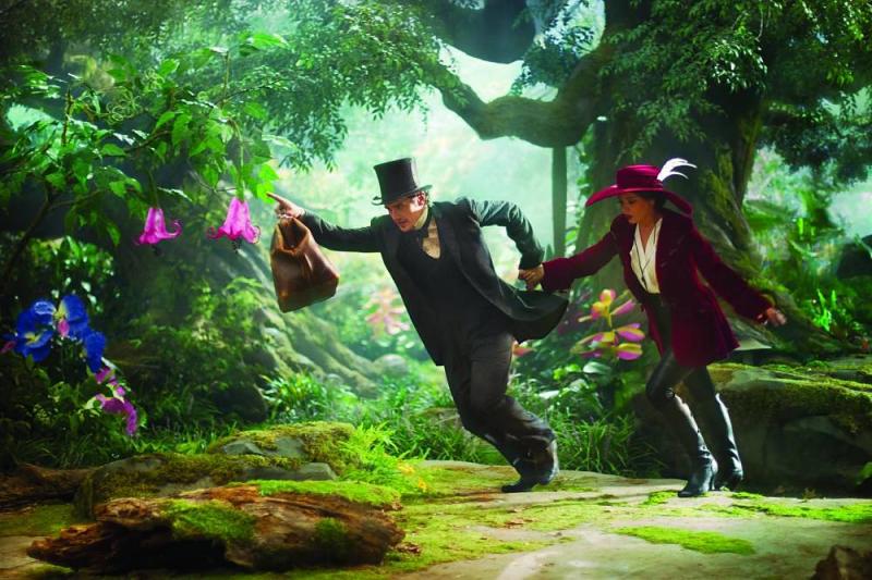 A smirking Franco and a simpering Kunis negotiate a CGI landscape in 'Oz The Great and Powerful'