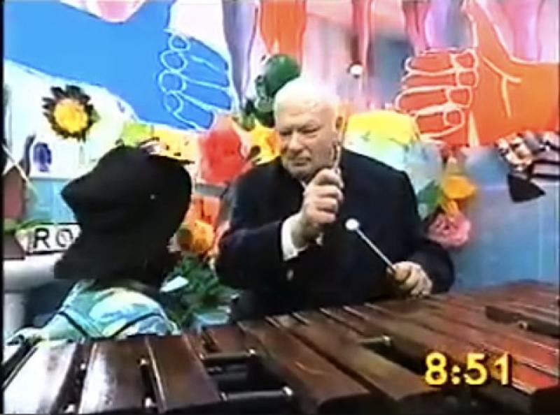 Popular hit: Moore gamely plays his instrument on Big Breakfast TV in early 1990s