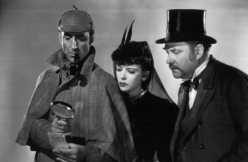 Basil Rathbone (left) as Sherlock Holmes, with Ida Lupino and Nigel Bruce