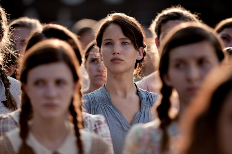 Katniss (Jennifer Lawrence) attends the Reaping ceremony
