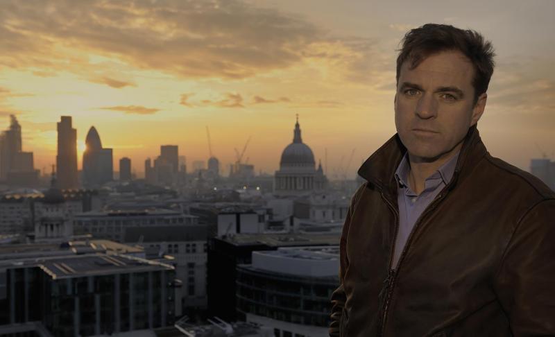 Niall Ferguson in front of the sunset of the West