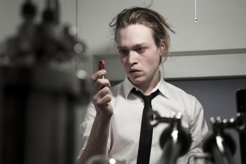 Syd March (Caleb Landry Jones) gets high on his own celebrity supply