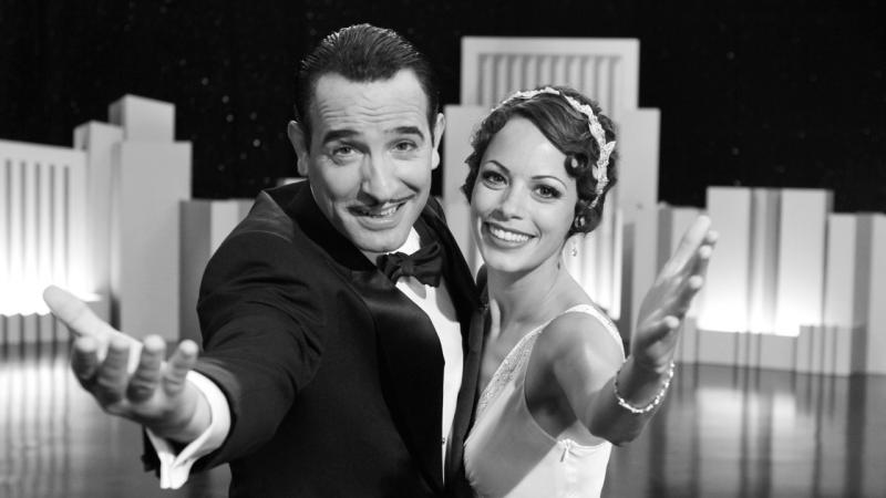 Former star George Valentin (Jean Dujardin) and rising star Peppy Miller (Bérénice Bejo) strike a pose