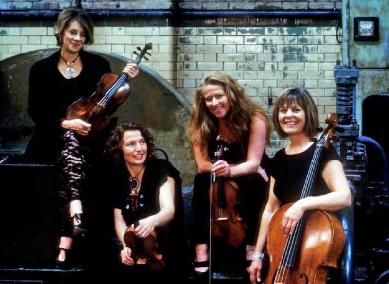 String players of the Britten Sinfonia, with director Jacqueline Shave second from right