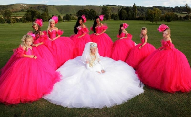 Bridget the fairy-tale bride, surrounded by her retinue of bridesmaids Bridget the fairy-tale bride, surrounded by her retinue of bridesmaids