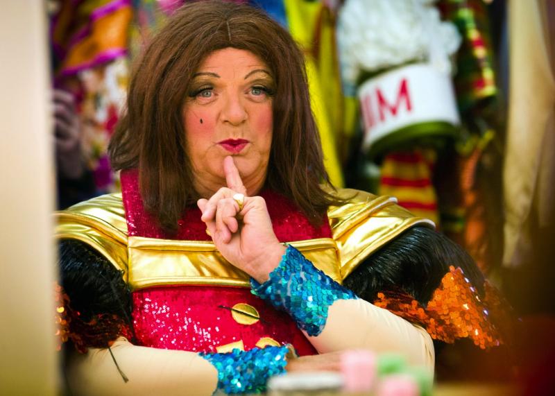 Ooh er missus: Michael Grade in frock and slap