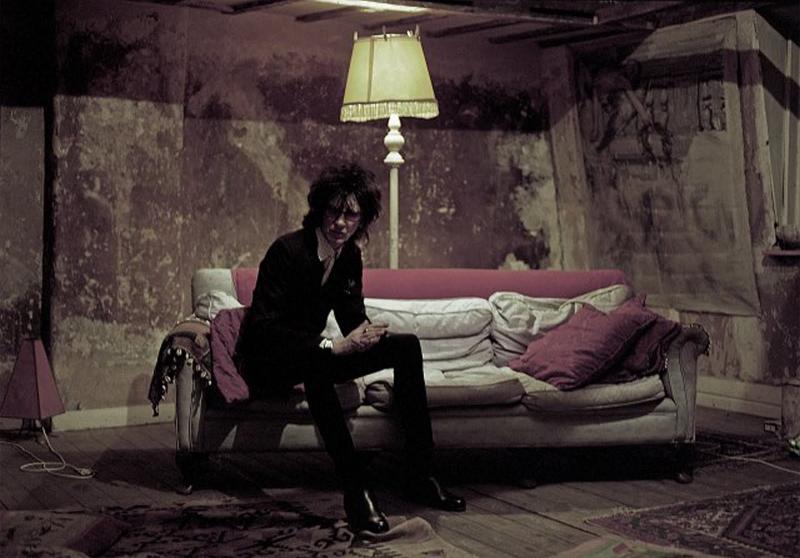 John Cooper Clarke relaxes in suitably gritty surroundings
