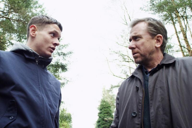 What are we doing here? Adam (Jack O'Connell, left) and Roy (Tim Roth) confront existential questions in 'The Liability'