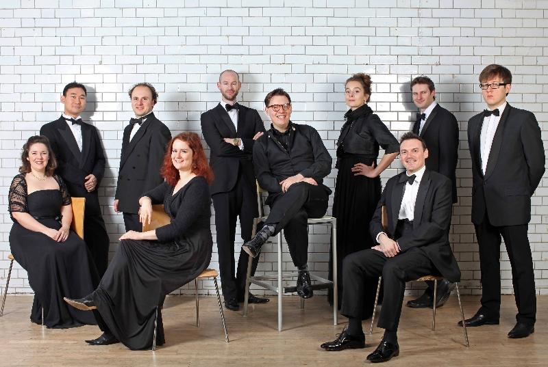 Members of La Nuova Musica with director David Bates (seated centre)