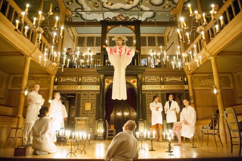 Candlelit treat: 'Music' descends to sing prologue