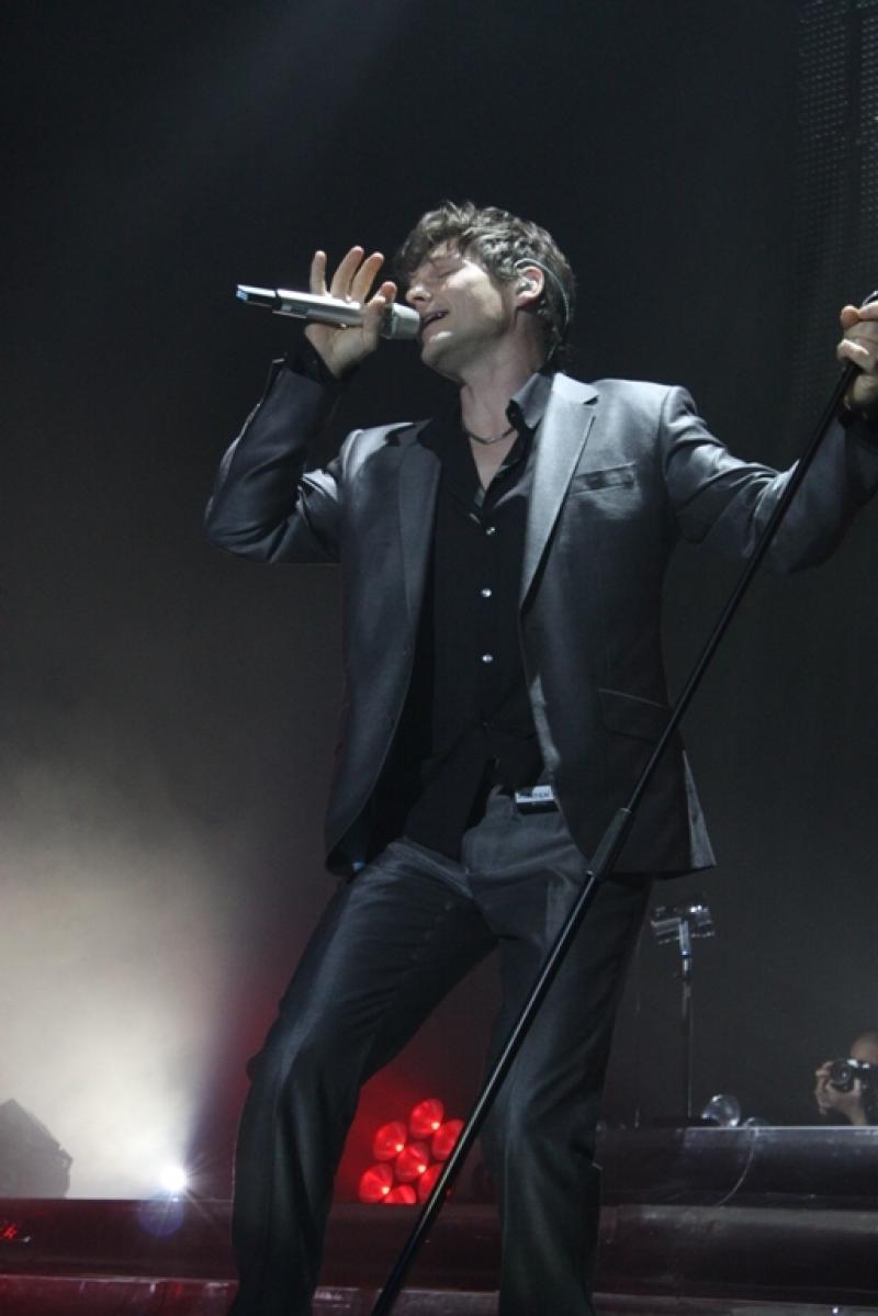 Take on him: Morten Harket 'was largely silent, bobbing from side to side while smiling enigmatically'