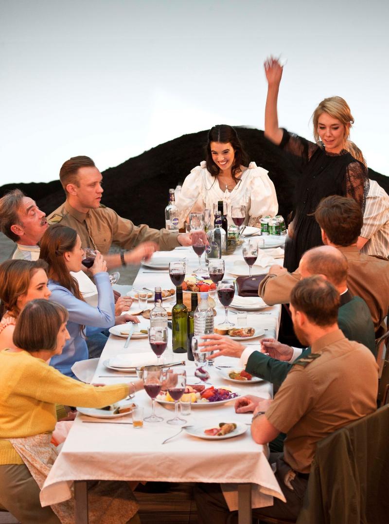 Lunchtime at the Prozorovs', with Gala Gordon's Irina at the head of the table and Vanessa Kirby's Masha standing