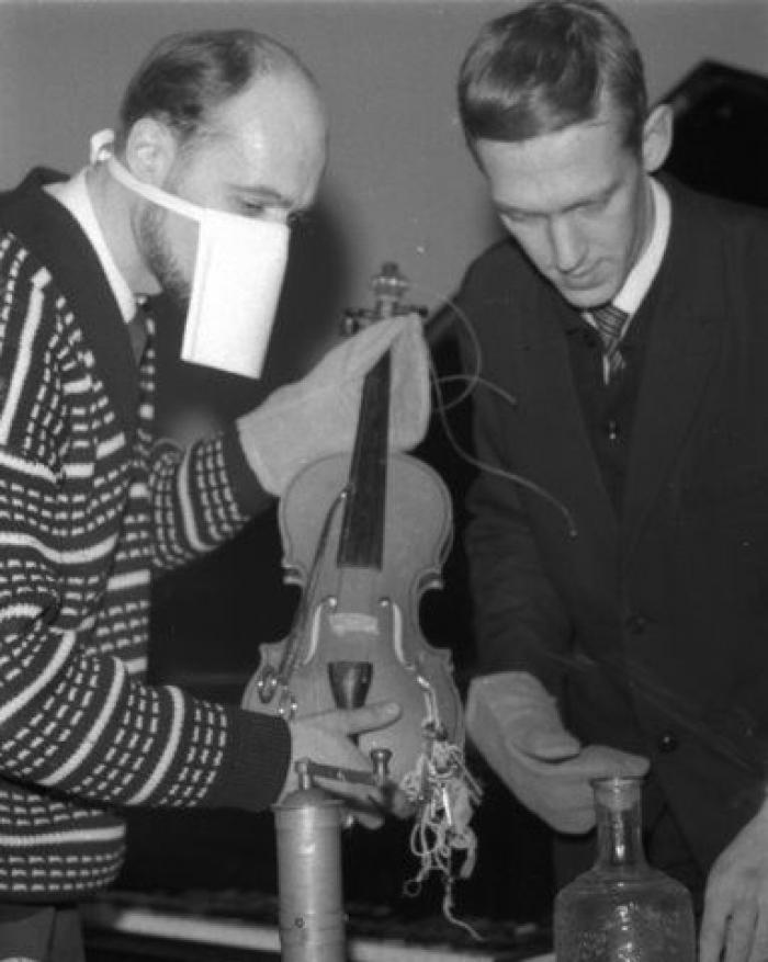 The man who burns violins: Arvo Pärt (left) takes part in a Sixties happening