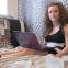 One Direction fan Linda at one with her laptop in her bedroom cave