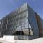 The new Jewish Museum's masculine and metallic exterior faces the monument ot the Ghetto Heroes