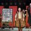 Iain Paterson's Hans Sachs (second from right) eggs on novice Walter (Gwyn Hughes Jones, standing on chair) in his new song