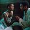 Not to survive but to live: Lupita Nyong'o, Best Supporting Actress nominee, with Best Actor Nominee Chiwetel Ejiofor in '12 Years A Slave'