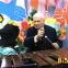 Popular hit: Moore gamely plays his instrument on Big Breakfast TV in early 1990s