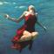 'The mermaids live beneath the ocean in a state of unselfconscious freedom until they come of age and swim up to the surface'