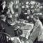 The Ghost of Christmas Present: Alastair Sim's Scrooge watches the feasting Cratchits