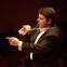 Conductor Andrew Litton: bouncing around like a rubber ball, busily keeping track Conductor Andrew Litton: bouncing around like a rubber ball, busily keeping track