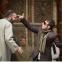 Propped up: Manolis Mavromatakis’s Mafioso king Simonides hilariously pulling a gun on Christos Loulis’s Pericles