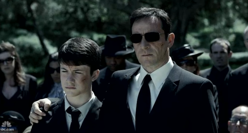 Britten (Jason Isaacs) with his son (Dylan Minnette) in Awake