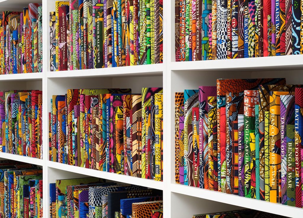 The War Library, 2024 [detail]. Courtesy Yinka Shonibare CBE and Goodman Gallery, Cape Town, Johannesburg, London and New York; James Cohan Gallery, New York; and Stephen Friedman Gallery, London and New York. Photo: © Stephen White & Co.