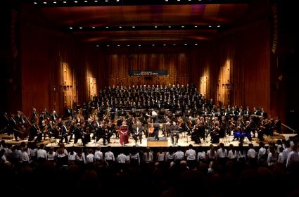 A great beast of an orchestra: Simon Rattle conducts the LSO, the London Symphony Chorus and children of Tiffin School