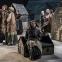 Grace Saif as Healer’s daughter and the company in Rae Smith’s medieval village