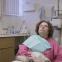 Dina: a 48-year-old widow who views the world with childlike optimism