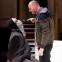 Thug (Charles Mnene) and policeman (Michael Elkin) come face to face in 'Mottled Lines'