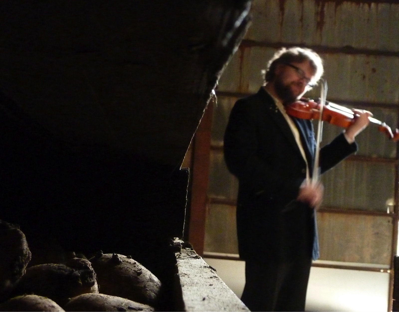 Violinist Alexander Janiczek in the Cambo potato barn