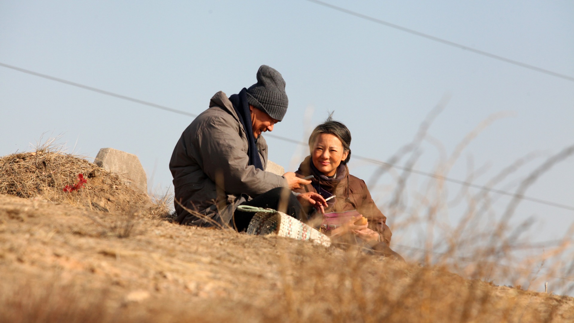 Yaojun (Wang Jingchun) and Liyun (Yong Mei) in So Long, My Son