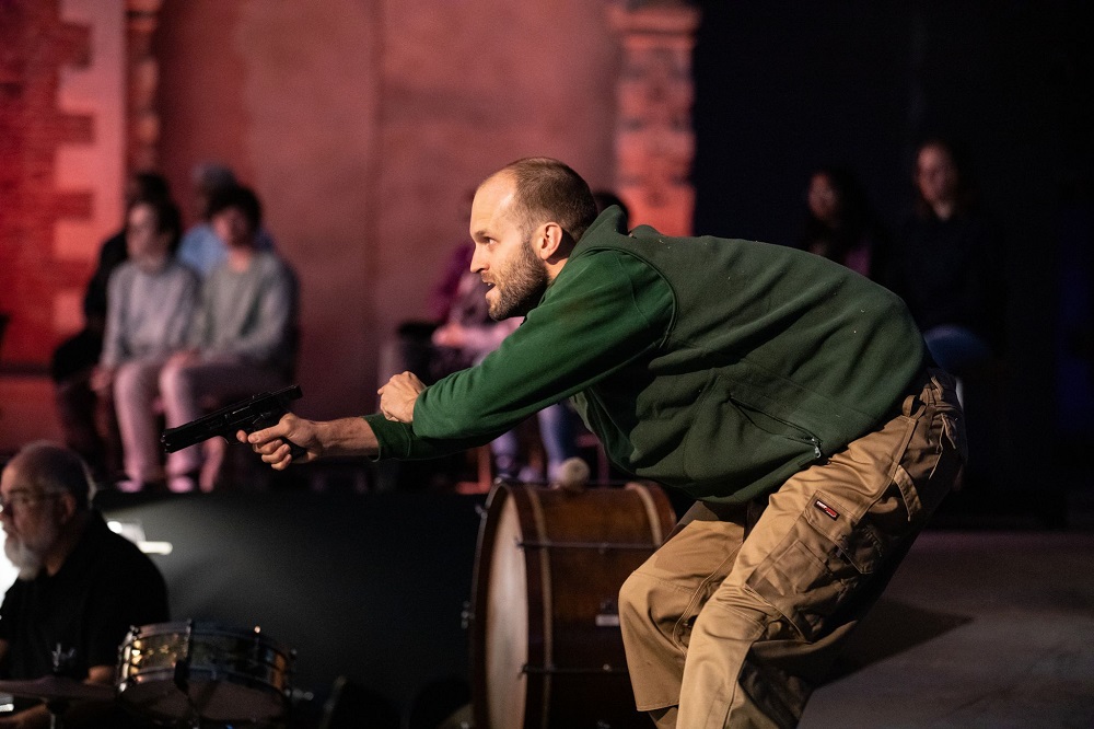 Ashley Riches as the Poacher in The Cunning Little Vixen