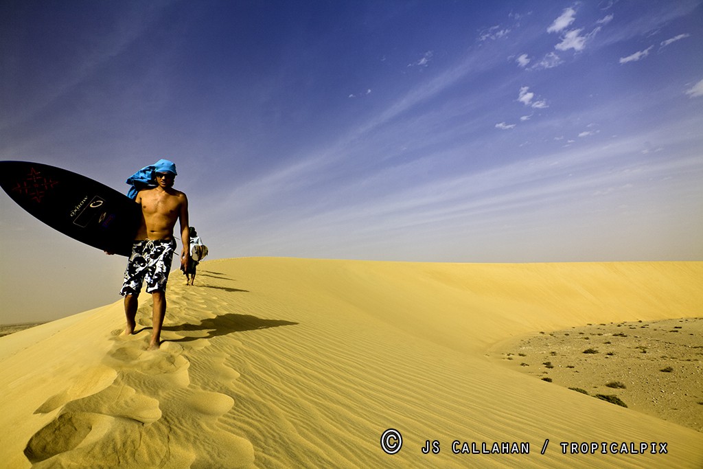 SamBleakley5.jpg_surfer_dude_in_dunes