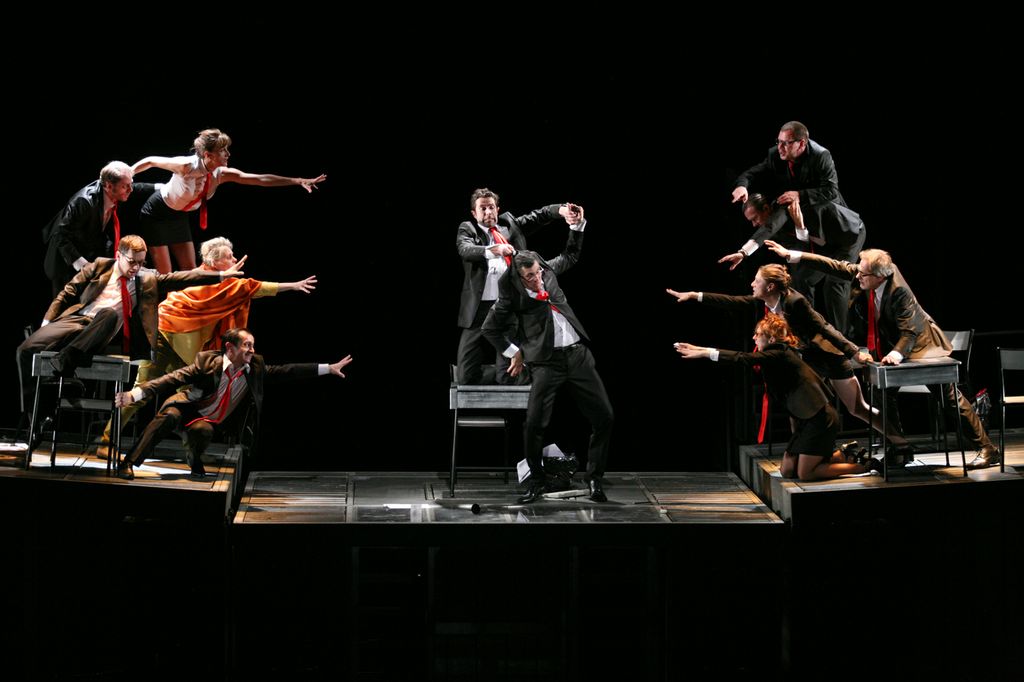 Ensemble in Theatre de la Vile's Rhinoceros at the Barbican