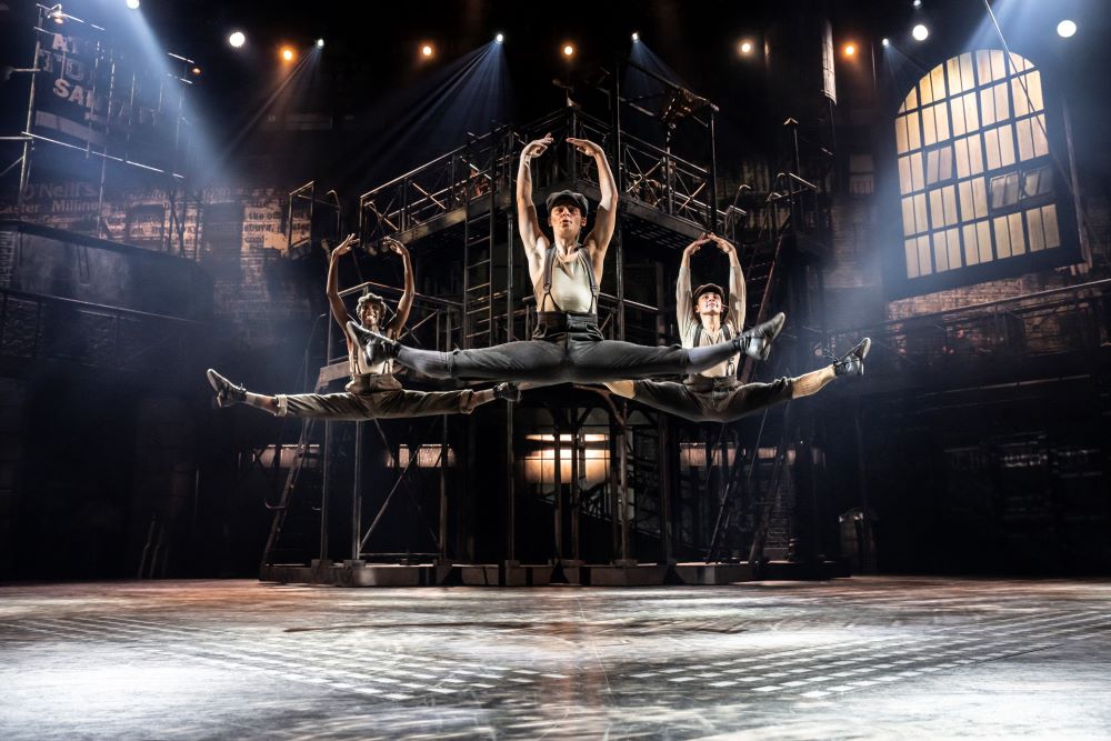 (L to R) Mukeni Nei, Cameron Jones and Mark Samaras in 'Newsies' at the Troubadour Wembley Park Theatre